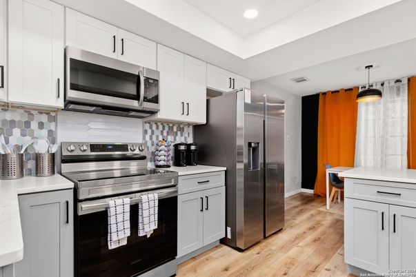 Interior, Kitchen, Pendant Lights, Recessed Lighting, Stainless Steel Appliances, Wood Texture Flooring
