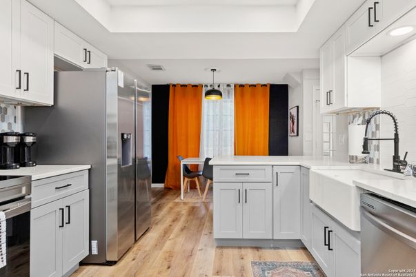 Dining room, Interior, Kitchen, Pendant Lights, Stainless Steel Appliances, Wood Texture Flooring