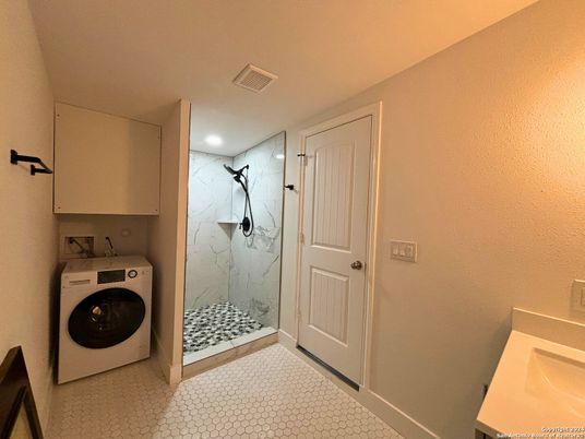 Bathroom, Glass Shower, Interior, Marble Walls, Recessed Lighting, Washer