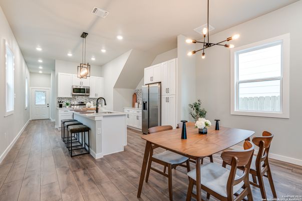 Dining room, Interior, Kitchen, Pendant Lights, Recessed Lighting, Stainless Steel Appliances, Wood Texture Flooring