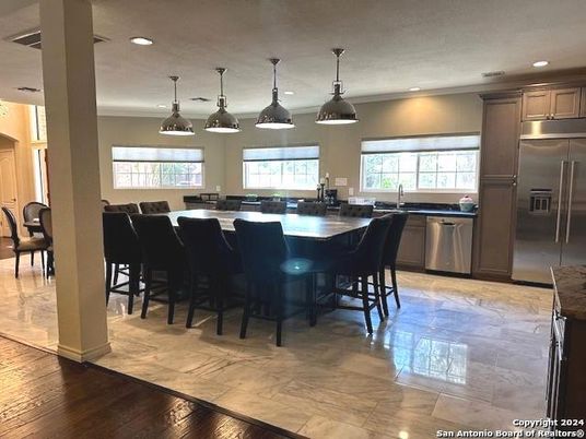 Dining room, Interior, Kitchen, Pendant Lights, Recessed Lighting, Stainless Steel Appliances, Wood Texture Flooring