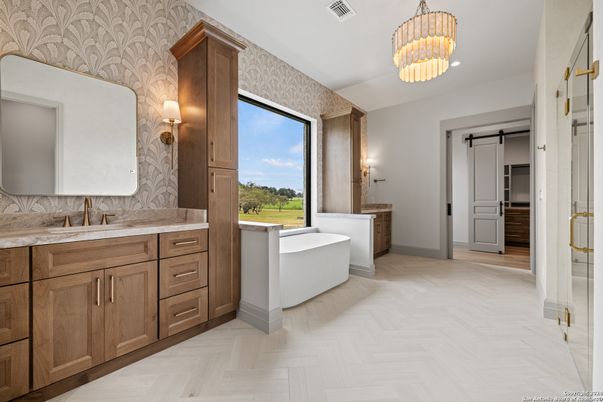 Bathroom, Chandelier, Dual Sink Vanities, Free Standing Baths, Interior, Pendant Lights, Wood Texture Flooring