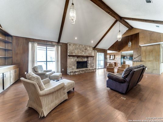 Fireplace, Interior, Living room, Pendant Lights, Recessed Lighting, Stone Walls, Wooden Beams, Wood Texture Flooring, Wooden Walls