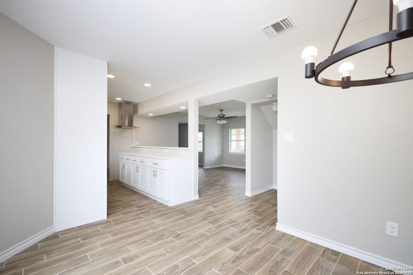Empty room, Interior, Kitchen, Pendant Lights, Recessed Lighting, Wood Texture Flooring