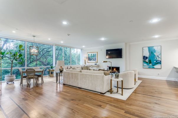 Dining room, Fireplace, Interior, Living room, Pendant Lights, Recessed Lighting, Wood Texture Flooring