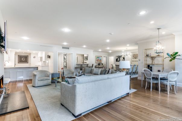 Dining room, Fireplace, Interior, Living room, Pendant Lights, Recessed Lighting, Wood Texture Flooring