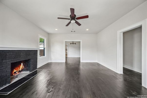Empty room, Fireplace, Interior, Recessed Lighting, Wood Texture Flooring