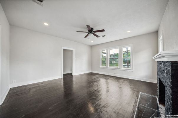 Empty room, Fireplace, Interior, Recessed Lighting, Wood Texture Flooring