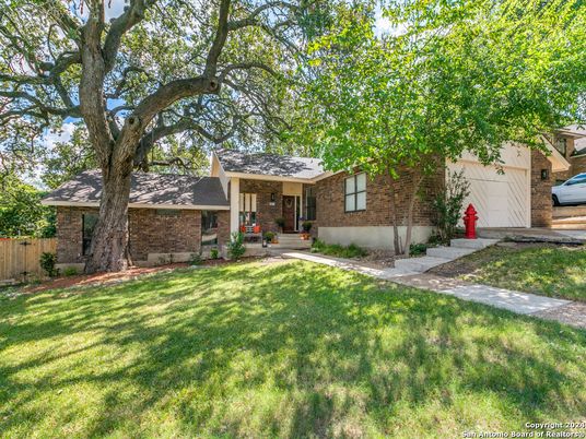 Attached, Backyard, Exterior, Facade, Brick Facade, Ranch