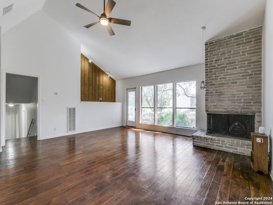 Empty room, Fireplace, Interior, Pendant Lights, Stone Walls, Wood Texture Flooring
