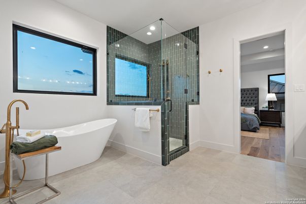 Bathroom, Free Standing Baths, Glass Shower, Interior, Recessed Lighting, Wood Texture Flooring