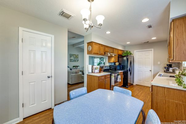Chandelier, Dining room, Interior, Kitchen, Recessed Lighting, Wood Texture Flooring