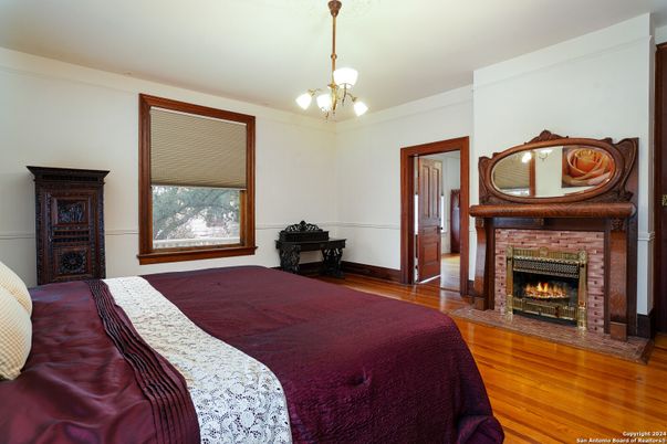 Bedroom, Fireplace, Interior, Pendant Lights, Wood Texture Flooring