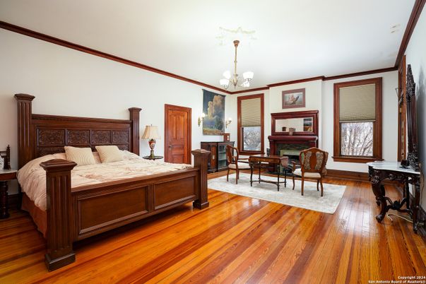 Bedroom, Chandelier, Fireplace, Interior, Wood Texture Flooring