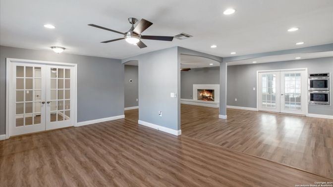 Empty room, Fireplace, Interior, Recessed Lighting, Wood Texture Flooring