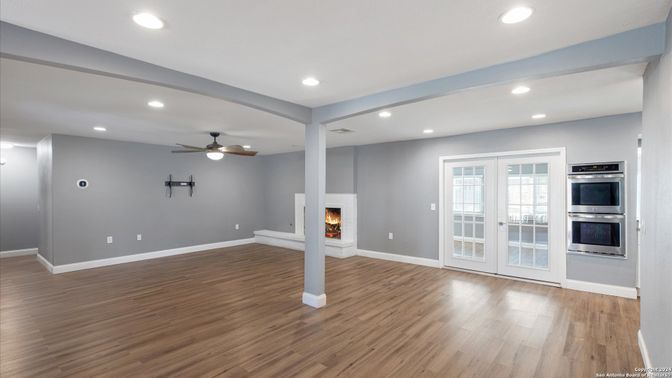 Empty room, Fireplace, Interior, Recessed Lighting, Wood Texture Flooring