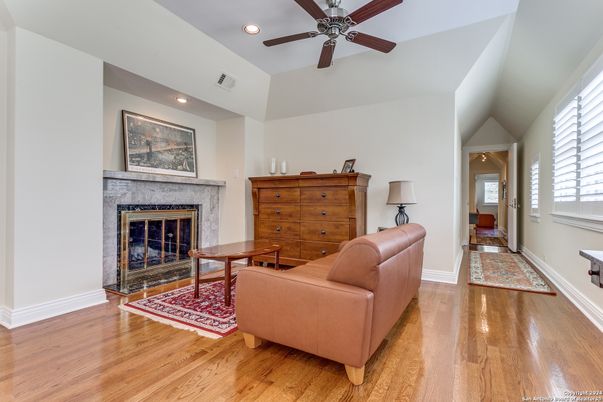 Fireplace, Interior, Living room, Recessed Lighting, Wood Texture Flooring