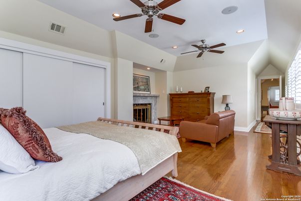 Bedroom, Fireplace, Interior, Recessed Lighting, Wood Texture Flooring