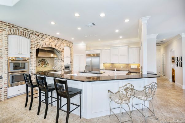 Interior, Kitchen, Recessed Lighting, Stainless Steel Appliances, Stone Walls