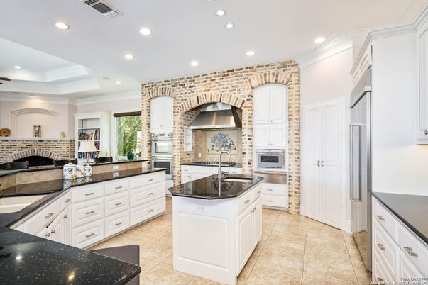 Interior, Kitchen, Recessed Lighting, Stainless Steel Appliances, Stone Walls