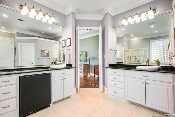 Bathroom, Dual Sink Vanities, Interior, Recessed Lighting, Wood Texture Flooring