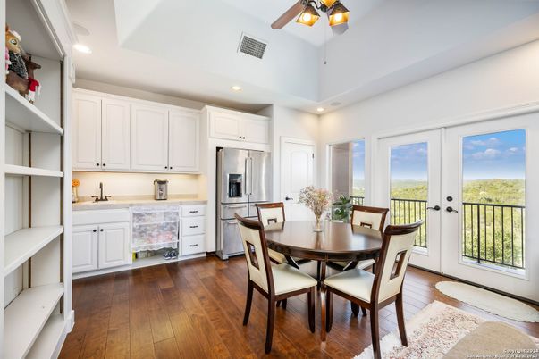Dining room, Interior, Kitchen, Recessed Lighting, Stainless Steel Appliances, Wood Texture Flooring