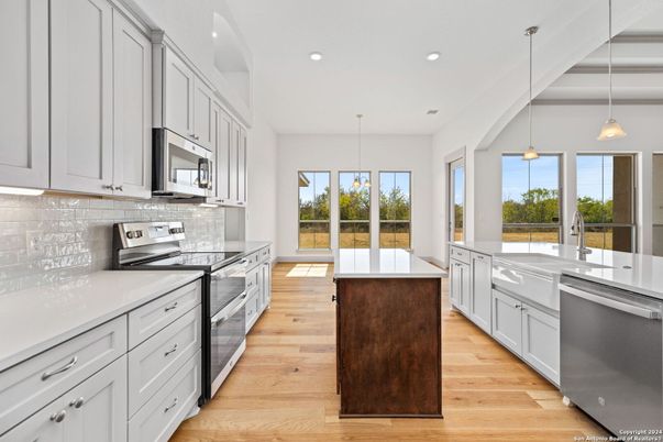 Interior, Kitchen, Pendant Lights, Recessed Lighting, Stainless Steel Appliances, Wood Texture Flooring