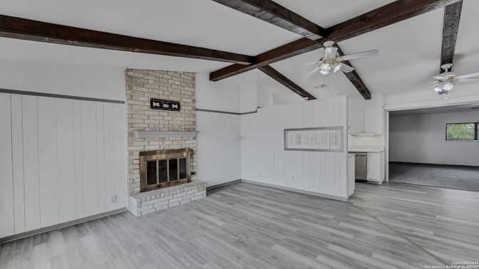 Empty room, Fireplace, Interior, Stone Walls, Wooden Beams, Wood Texture Flooring
