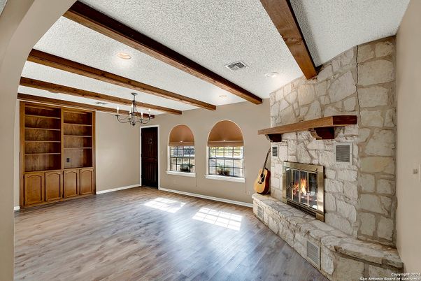 Chandelier, Fireplace, Interior, Recessed Lighting, Stone Walls, Wooden Beams, Wood Texture Flooring