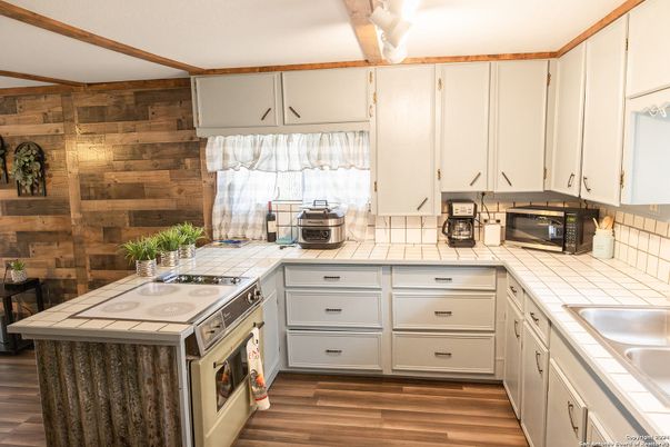 Interior, Kitchen, Tile Countertops, Wood Texture Flooring