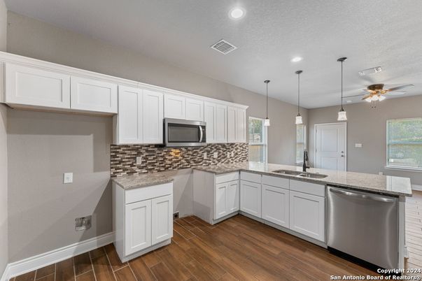 Interior, Kitchen, Pendant Lights, Recessed Lighting, Stainless Steel Appliances, Wood Texture Flooring