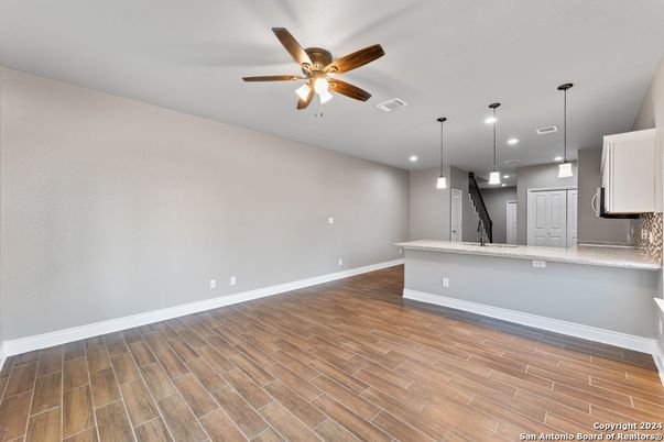 Empty room, Interior, Kitchen, Pendant Lights, Recessed Lighting, Wood Texture Flooring