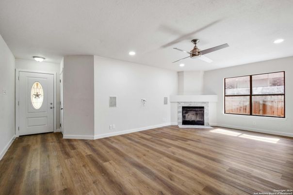 Empty room, Fireplace, Interior, Recessed Lighting, Wood Texture Flooring