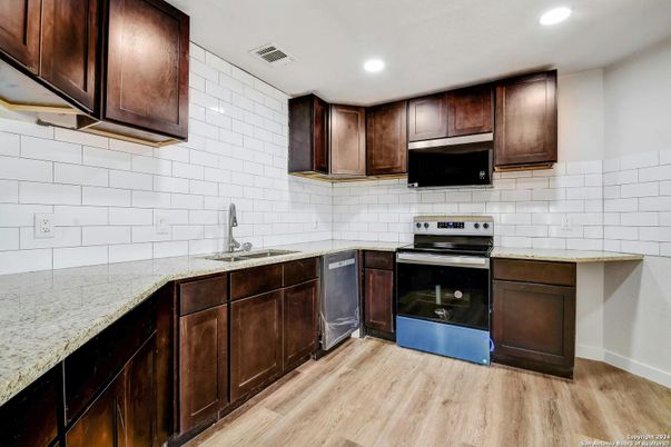Interior, Kitchen, Recessed Lighting, Stainless Steel Appliances, Wood Texture Flooring
