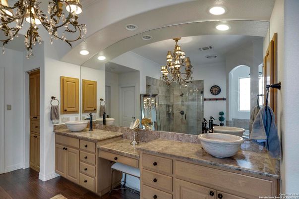 Bathroom, Chandelier, Dual Sink Vanities, Glass Shower, Interior, Recessed Lighting, Wood Texture Flooring