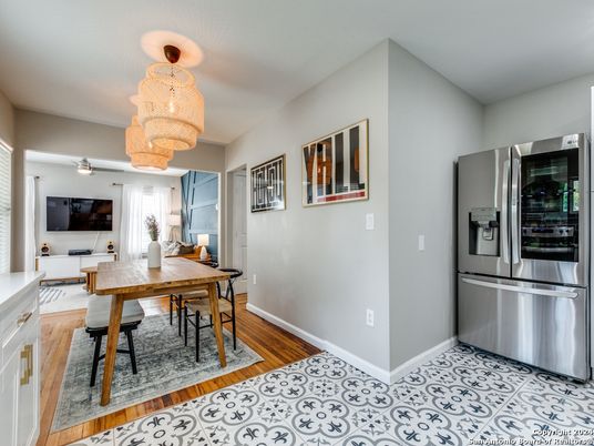 Chandelier, Dining room, Interior, Kitchen, Stainless Steel Appliances, Wood Texture Flooring