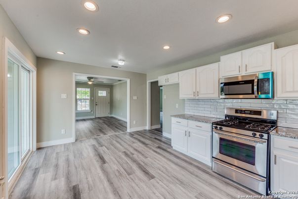 Interior, Kitchen, Recessed Lighting, Stainless Steel Appliances, Wood Texture Flooring
