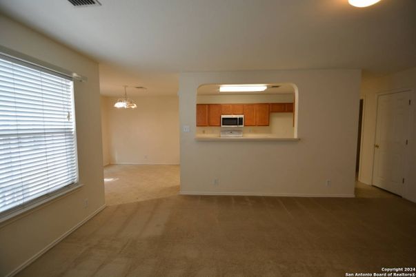 Chandelier, Empty room, Interior, Kitchen, Pendant Lights, Stainless Steel Appliances