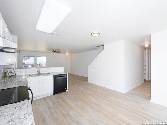 Interior, Kitchen, Tile Countertops, Wood Texture Flooring