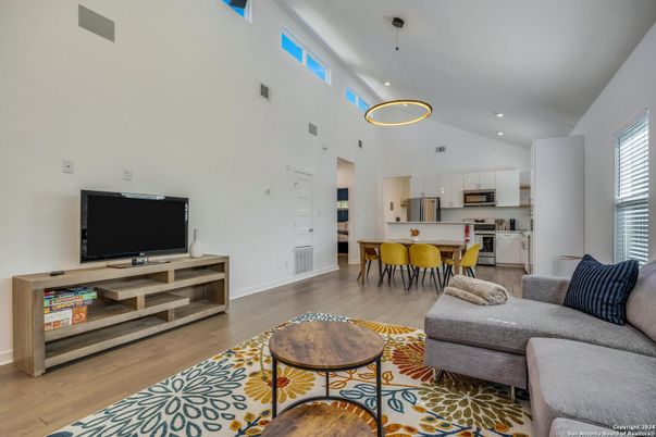 Dining room, Interior, Kitchen, Living room, Pendant Lights, Recessed Lighting, Stainless Steel Appliances, Wood Texture Flooring