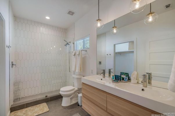 Bathroom, Dual Sink Vanities, Glass Shower, Interior, Pendant Lights, Recessed Lighting