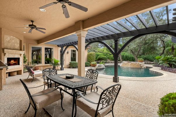 Exterior, Fireplace, Pool