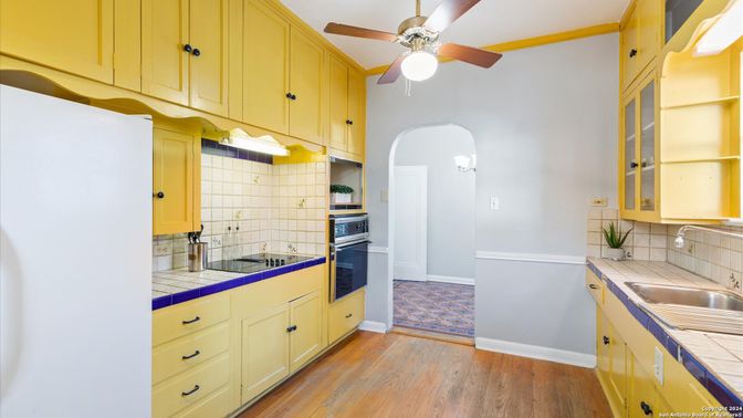 Interior, Kitchen, Tile Countertops, Wood Texture Flooring