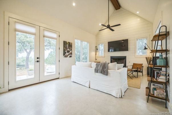 Fireplace, Interior, Living room, Recessed Lighting, Stone Walls, Wooden Beams