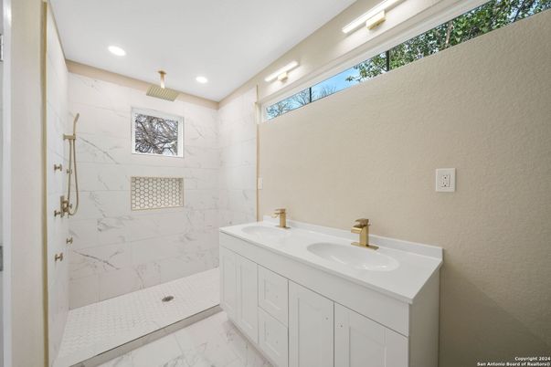 Bathroom, Dual Sink Vanities, Interior, Marble, Marble Walls, Recessed Lighting