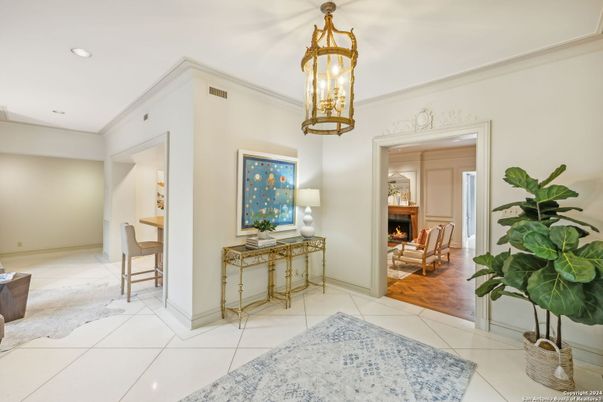 Chandelier, Dining room, Fireplace, Interior, Living room, Recessed Lighting, Wood Texture Flooring
