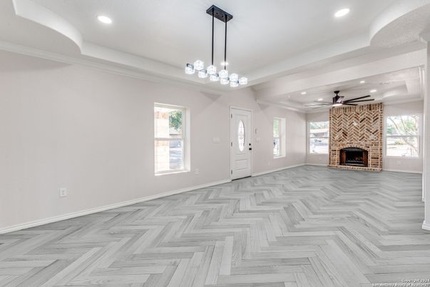 Empty room, Fireplace, Interior, Pendant Lights, Recessed Lighting, Wood Texture Flooring