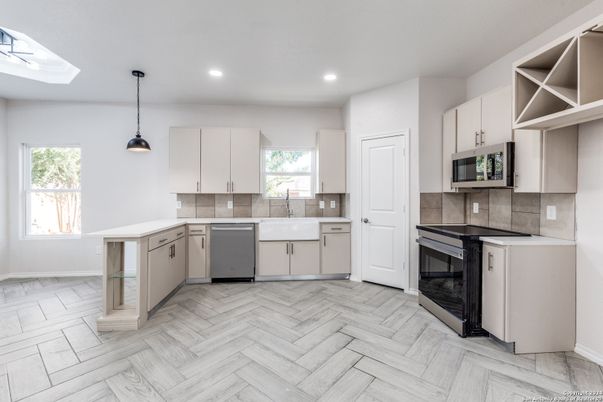 Interior, Kitchen, Pendant Lights, Recessed Lighting, Stainless Steel Appliances, Wood Texture Flooring
