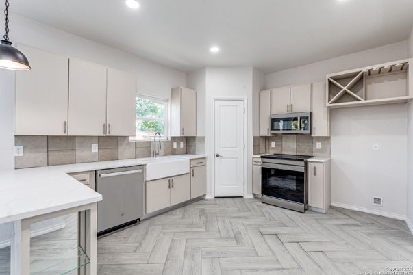 Interior, Kitchen, Pendant Lights, Recessed Lighting, Stainless Steel Appliances, Wood Texture Flooring