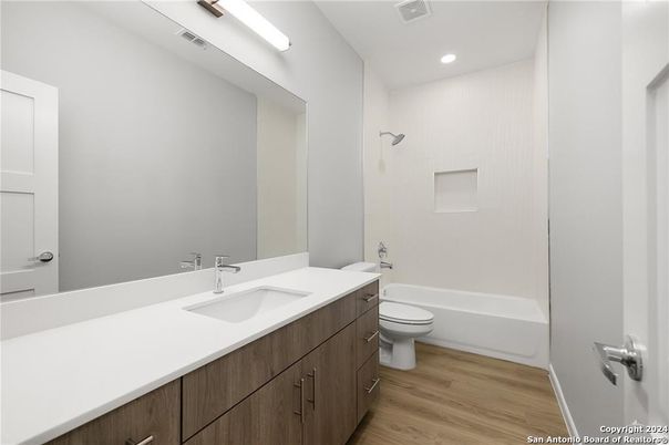 Bathroom, Dual Sink Vanities, Interior, Recessed Lighting, Wood Texture Flooring